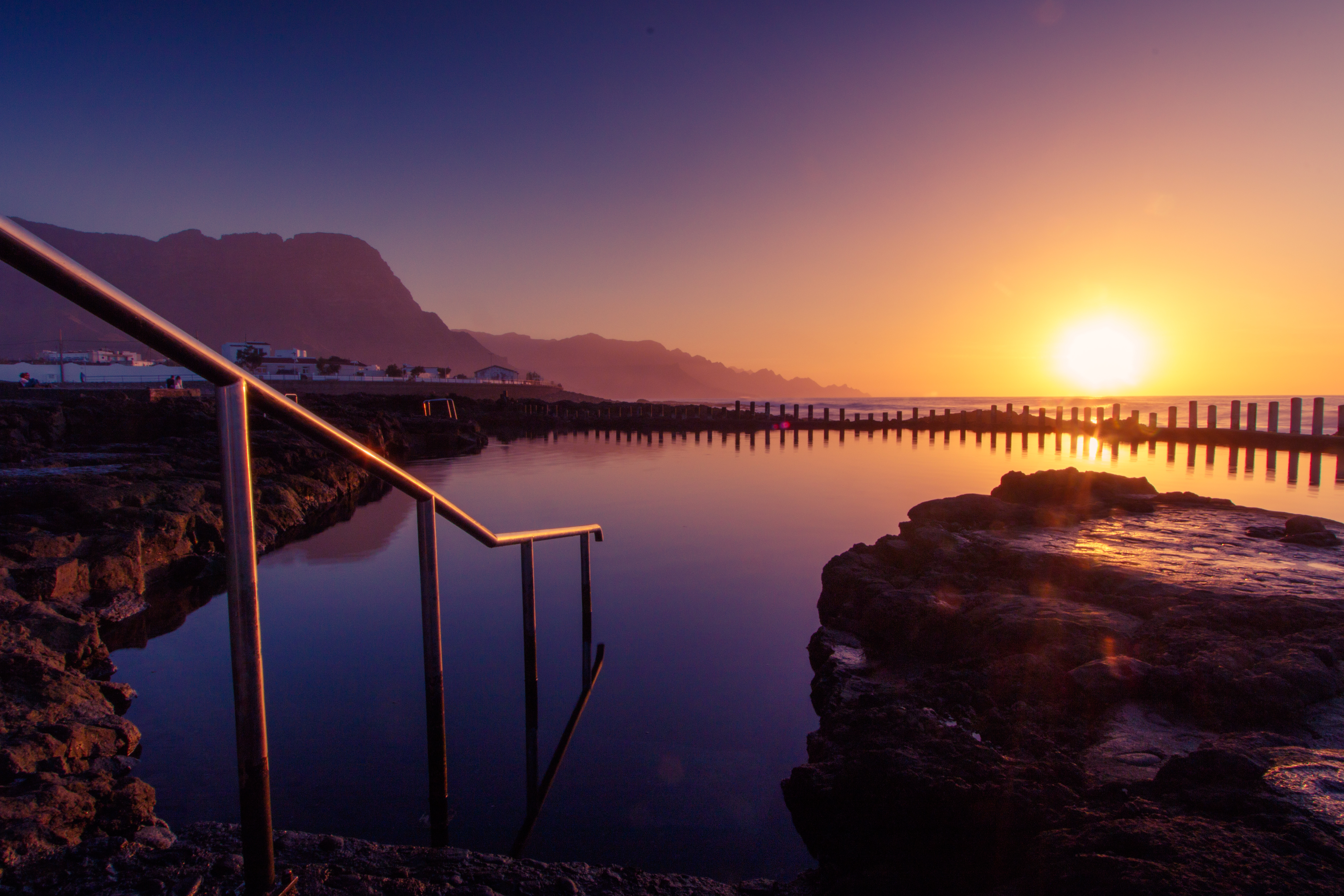 Sunset at the natural swimming pools of Agaete: Las Salinas